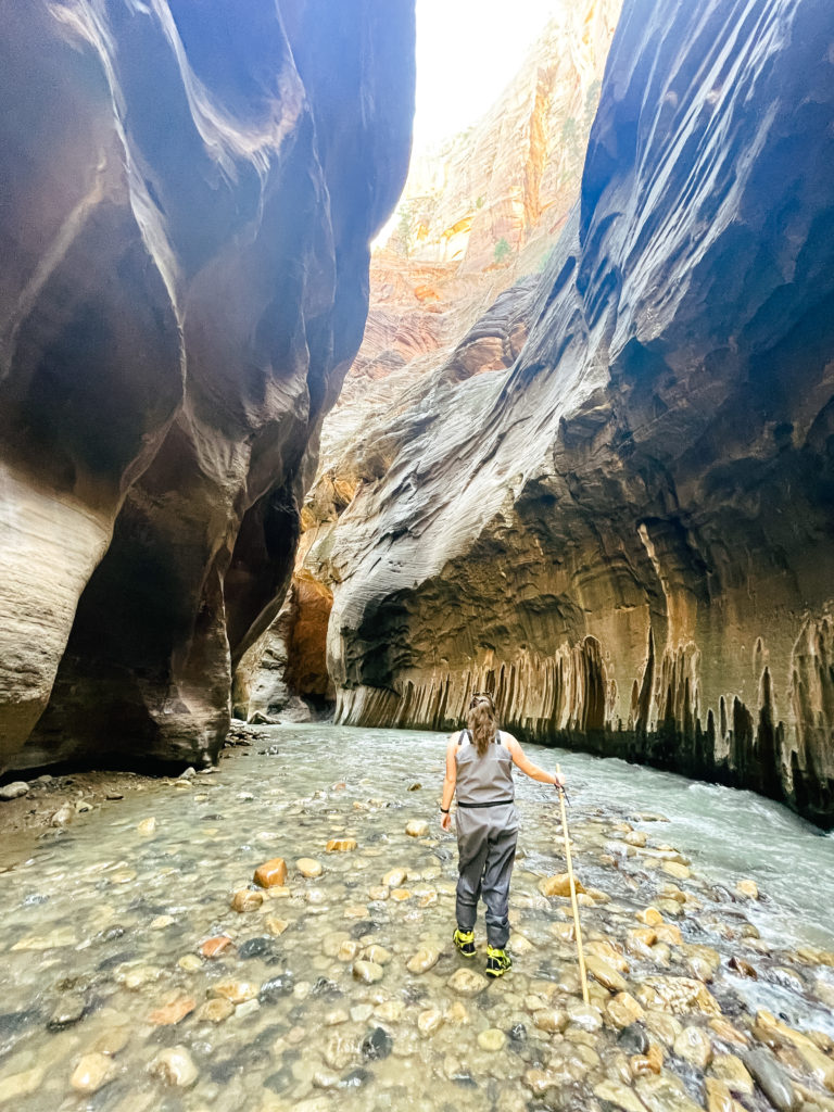 girl hiking the narrows