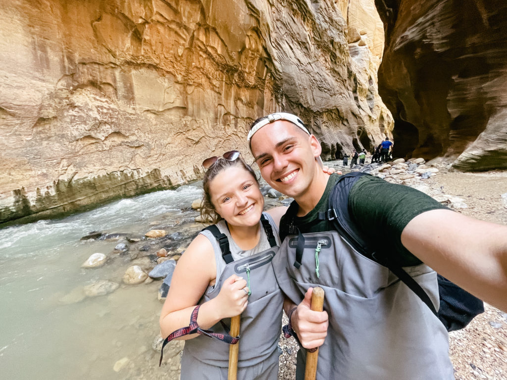 couple hiking in canyon