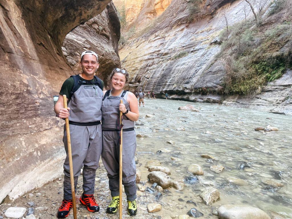 couple hiking at zion