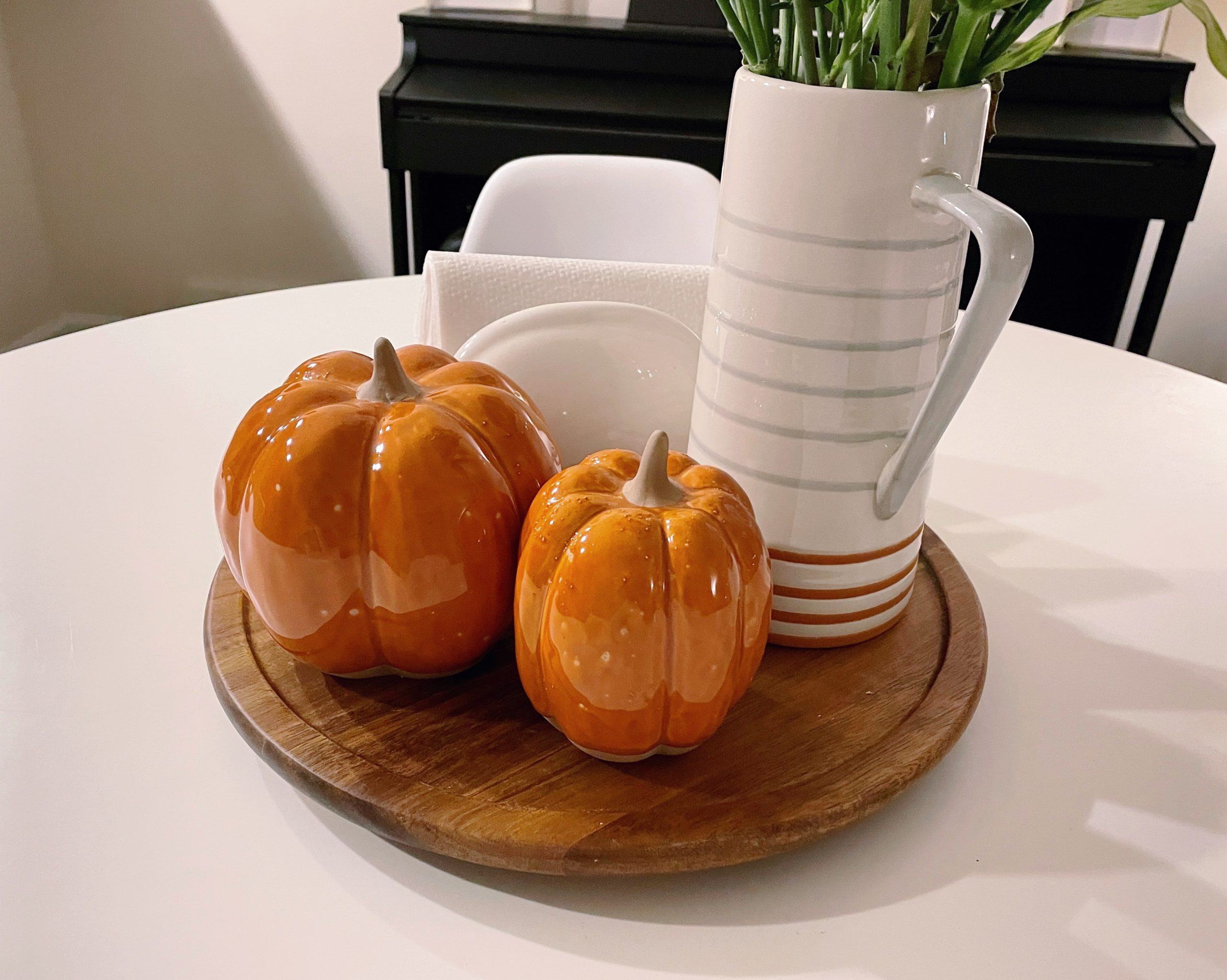 Fall decor pumpkins and vase